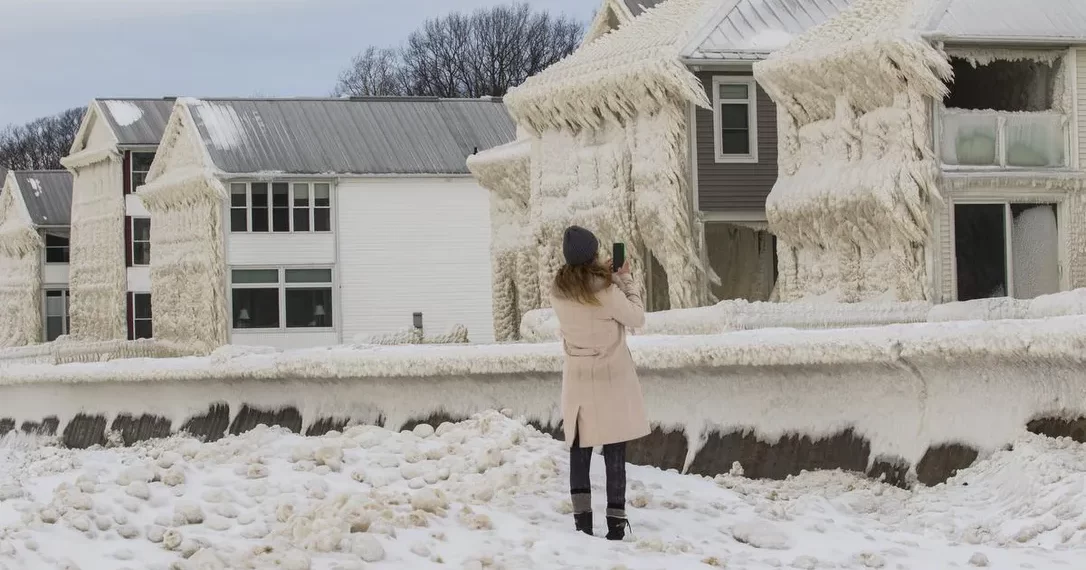 After a storm covered their homes in ice, residents along Lake Erie brace for flooding –