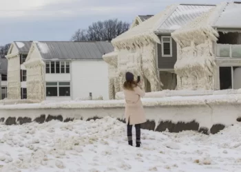 After a storm covered their homes in ice, residents along Lake Erie brace for flooding –