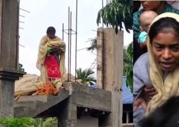 হৃদয় কঁপি যোৱা এক দৃশ্য! হাতত ২ মহীয়া কেঁচুৱা লৈ চাদৰ পৰা আত্মহত্যাৰ চেষ্টা এগৰাকী মহিলাৰ; আৰক্ষীয়ে ক’লেও নাহে নামি, আচলতে ঘটনা কি…?