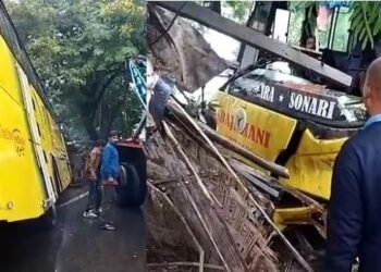 ভয়ংকৰ পথ দুৰ্ঘটনা; দলঙৰ সমীপত পথৰ পৰা বাগৰি পৰে নৈশ বাছ ‘ৰাজধানী’, কেইবাগৰাকীও যাত্ৰী আহত, ভাঙিল কেইবাখনো দোকান