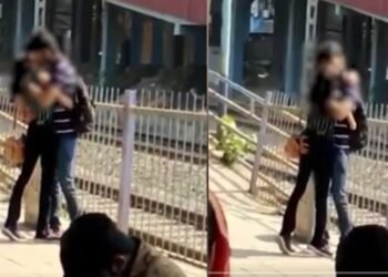 ৰে’লৱে ষ্টেচনত প্ৰেমিক-প্ৰেমিকাক ‘Kiss’কৰি থকা দেখা গ’ল; ৰাজহুৱা স্থানত কৰা এই কৰ্মৰ বাবে স্থানীয় ৰাইজৰ খং, দুয়োৰে বিৰুদ্ধে গোচৰ ৰুজু, ভাইৰেল হৈ পৰিছে Videoটো