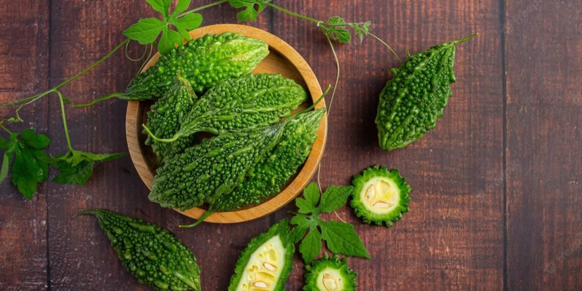 Health Tips: তিতা কেৰেলা (Bitter Gourd) সোৱাদত তিতা হ’বও পাৰে; কিন্তু ইয়াৰ আছে বহু মিঠা গুণ, লাভালাভবোৰ পঢ়িলে আপুনি কেতিয়াও নাখাও বুলি নক’ব, পিছে জানো আহক ইয়াৰ গুণাগুণবোৰ কি কি?